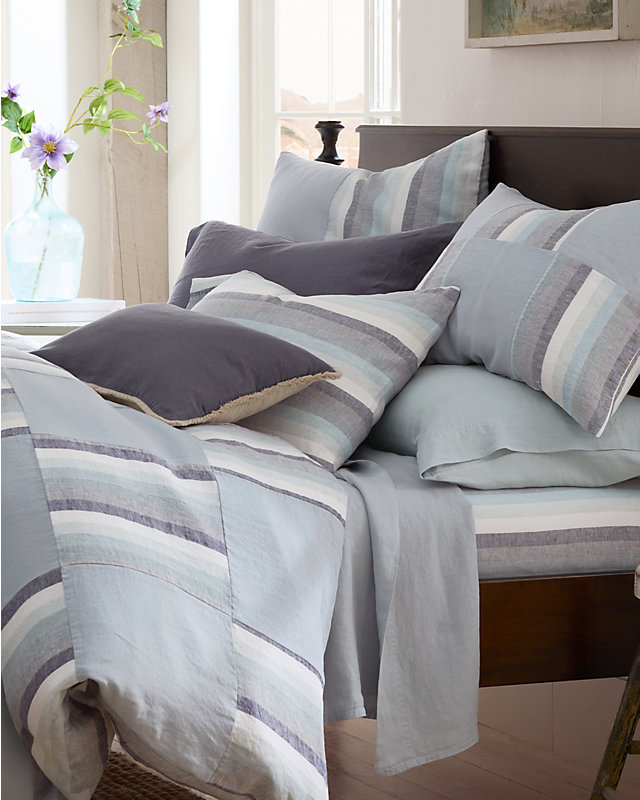 A bed with our Wildflower Relaxed-Linen bedding. Visit the home linen shop.